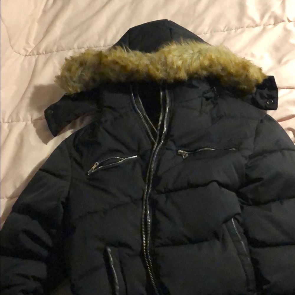 Brand new. NEVER WORN. Very heavy and warm
